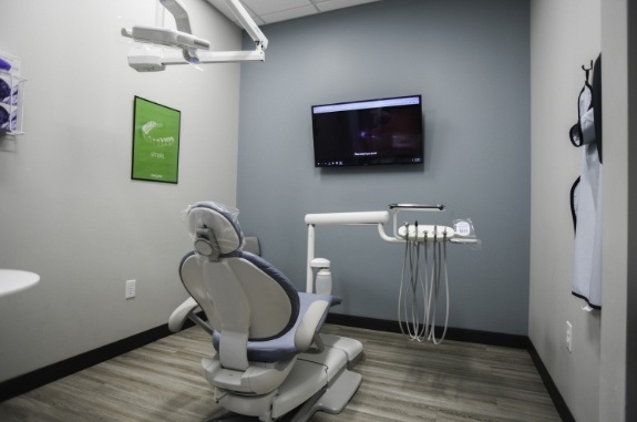 Dental treatment room with white walls