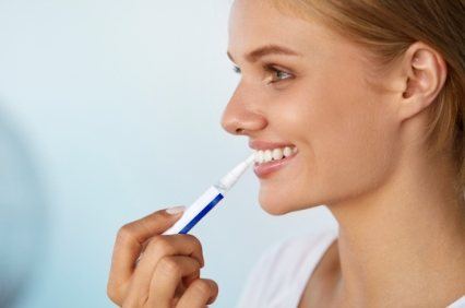 Woman brushing her teeth