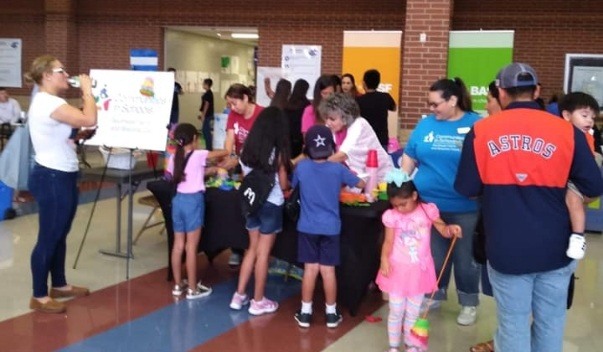 Kids at a table during community event