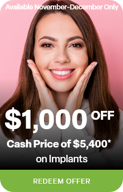 Woman in leather jacket leaning against brick wall