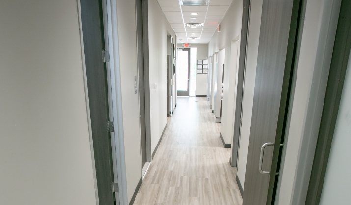 Hallway in Clute dental office leading to dental treatment rooms