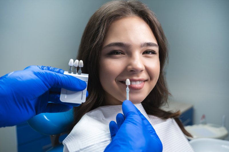 A young woman preparing for a dental veneer treatment